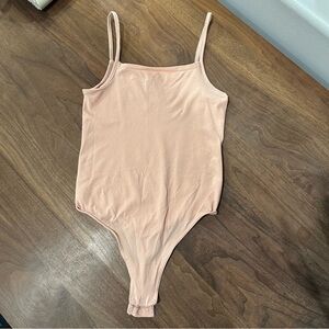 Wolford body suit size medium